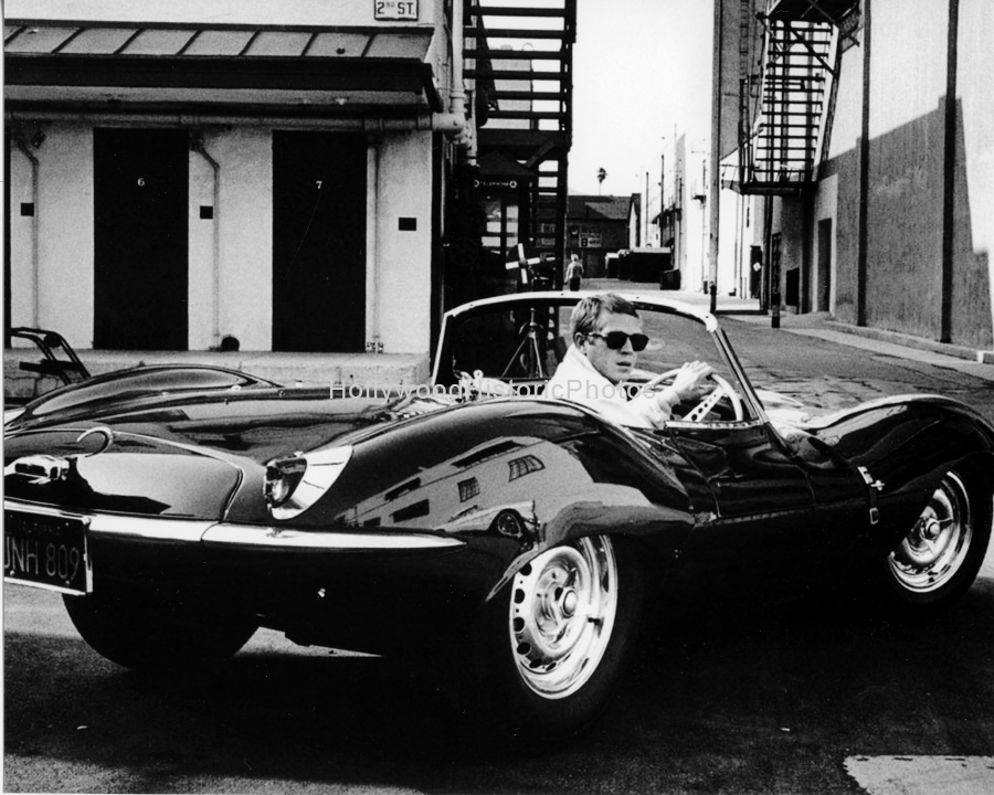 Steve McQueen 1963 Leaving Paramount Studios in his Jaguar copy.jpg